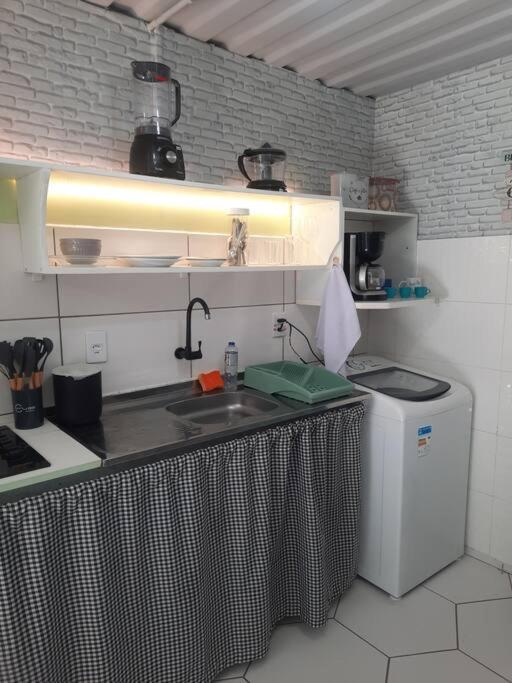 Kuchyň nebo kuchyňský kout v ubytování Apartamento Container com pátio, vaga para carro e Split
