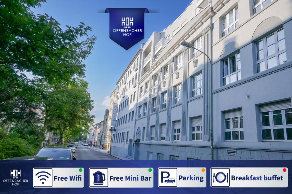 オッフェンバッハにあるHotel Offenbacher Hofの無料Wi-Fiの看板が掲げられた大きな白い建物