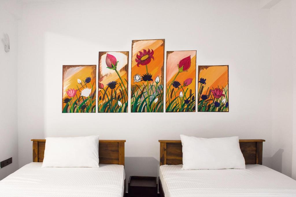 Postel nebo postele na pokoji v ubytování Gold Crown Residence
