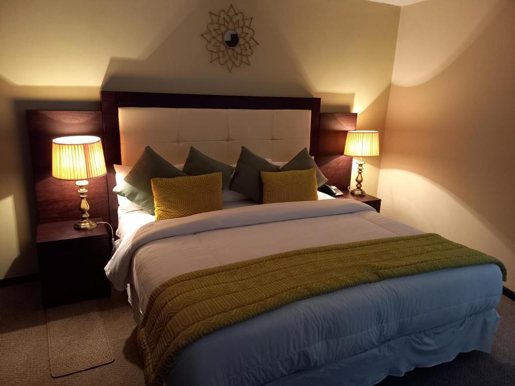Postel nebo postele na pokoji v ubytování Hotel Golosone