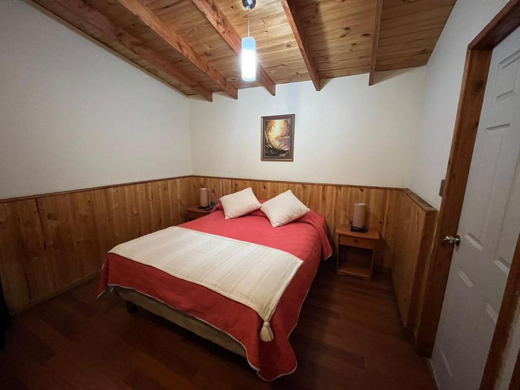 Voodi või voodid majutusasutuse Hostal Balmaceda La Serena toas