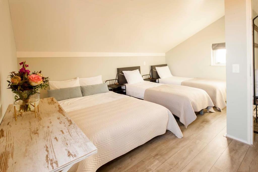 Postel nebo postele na pokoji v ubytování Vakantiehuis aan het water