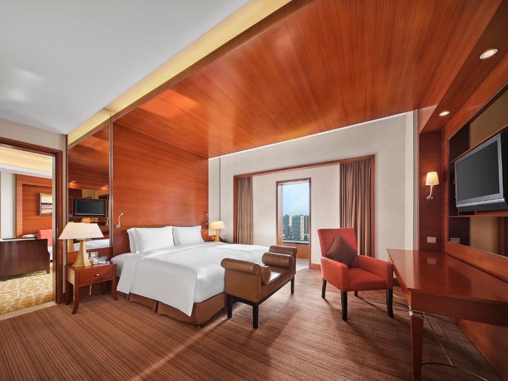 Postel nebo postele na pokoji v ubytování Hilton Hefei