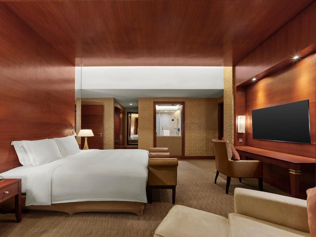 Postel nebo postele na pokoji v ubytování Hilton Hefei