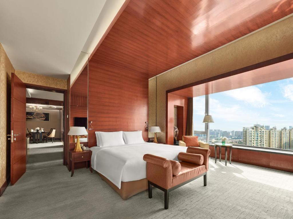 Postel nebo postele na pokoji v ubytování Hilton Hefei