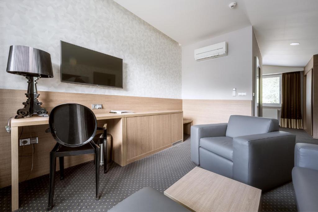 Telewizja i/lub zestaw kina domowego w obiekcie Hotel Jezerka