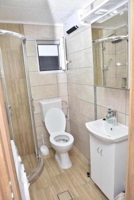 Koupelna v ubytování Dora Apartman