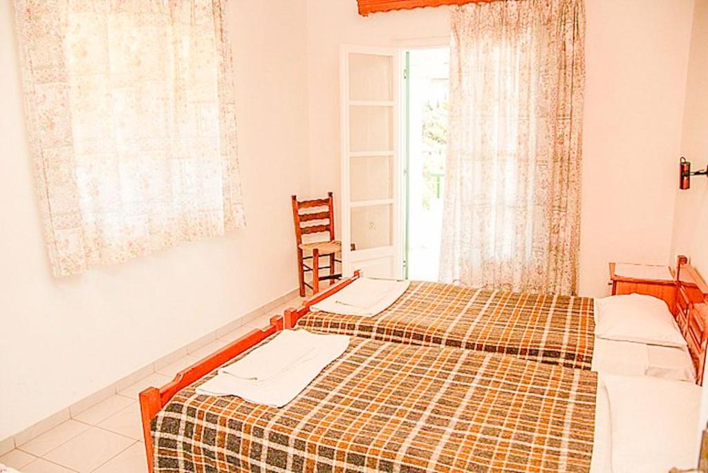 Postel nebo postele na pokoji v ubytování Fran Apartments