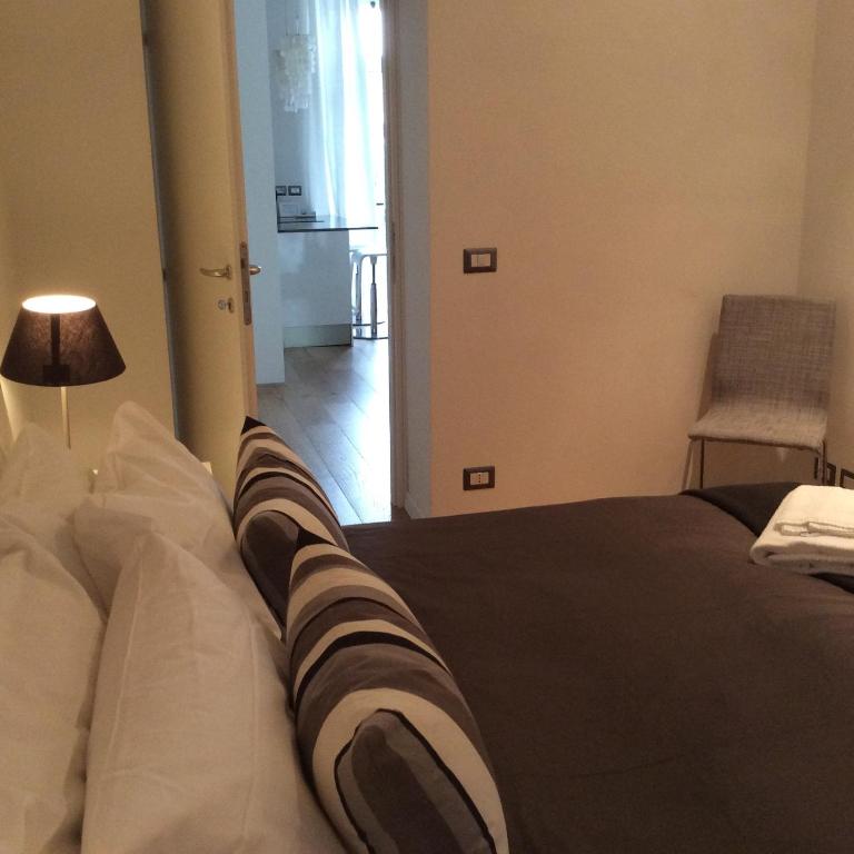 A bed or beds in a room at Casa Rinuccini