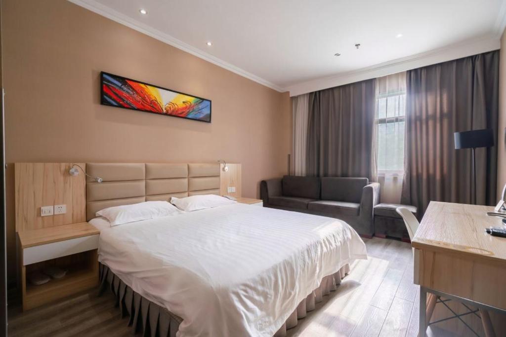 Letto o letti in una camera di Wuxi Fish Inn Rongxiang