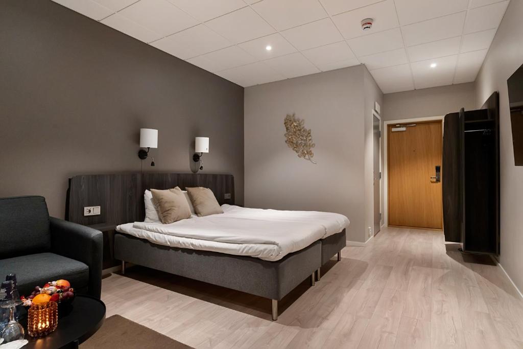 Postel nebo postele na pokoji v ubytování Quality Hotel Vänersborg