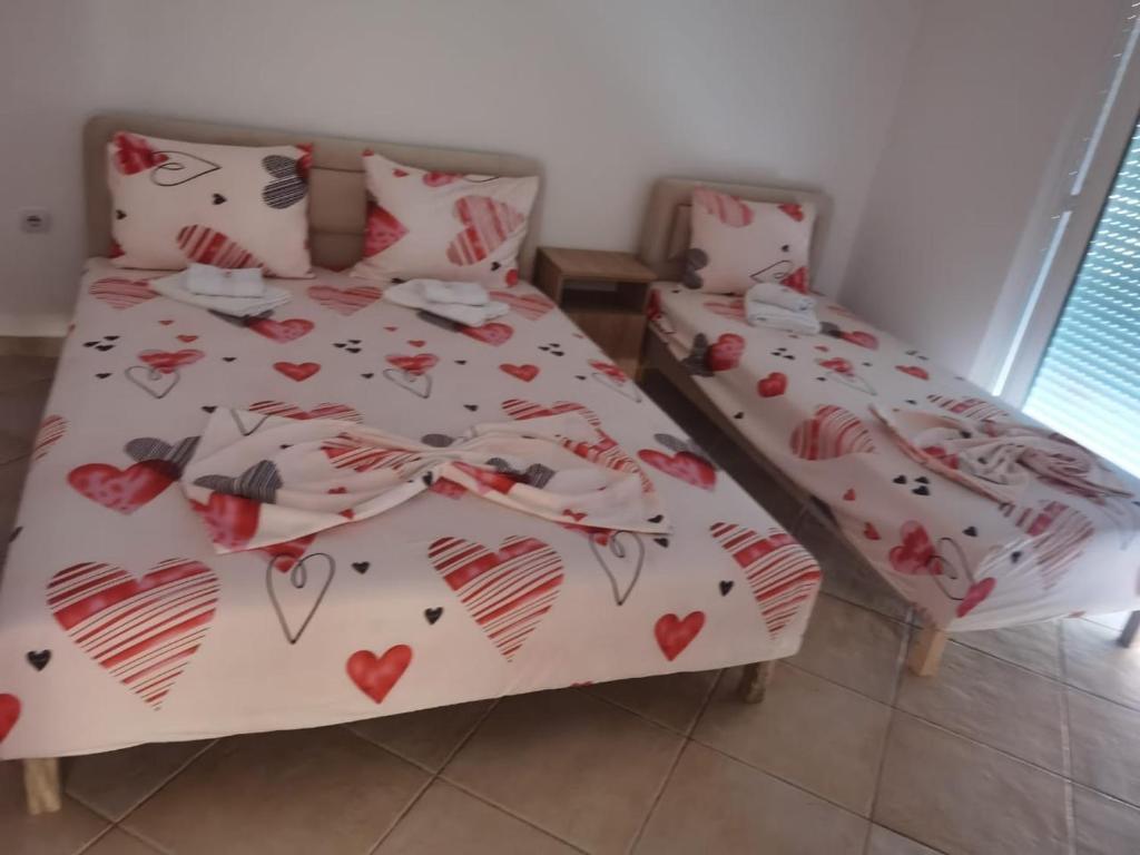 Postel nebo postele na pokoji v ubytování Apartments Luana