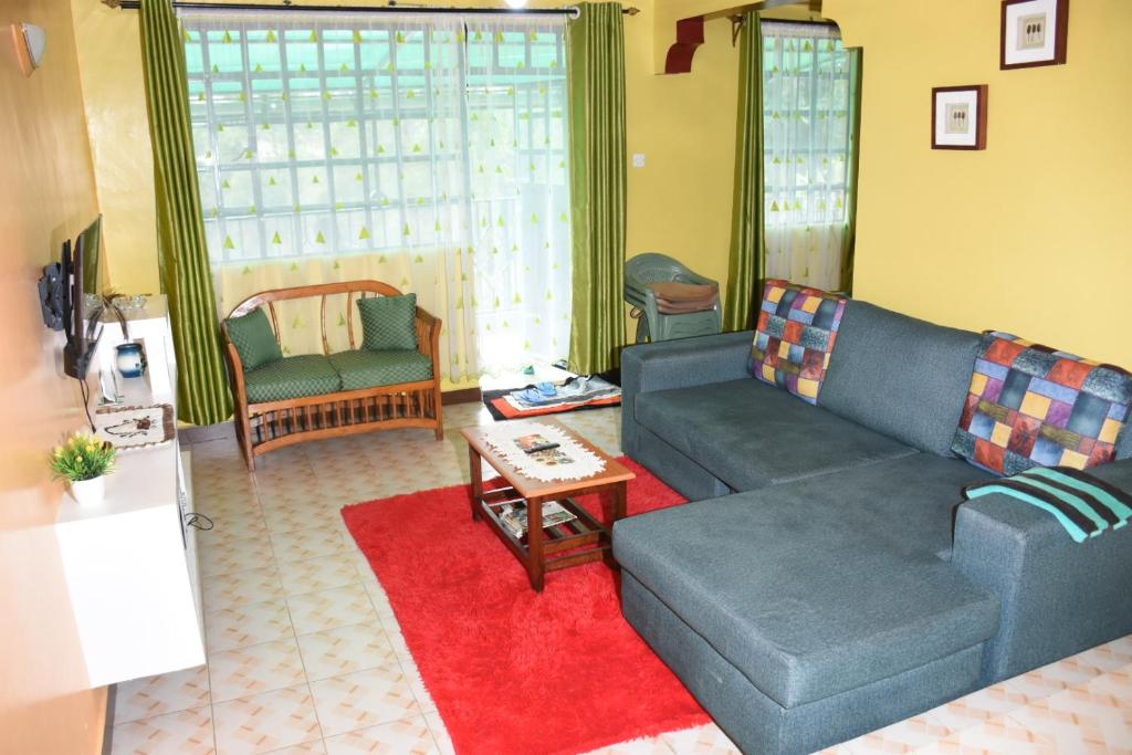 Posezení v ubytování 2-bedroom serenity homes
