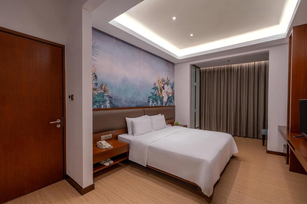 Postel nebo postele na pokoji v ubytování St Giles Gardens Kuala Lumpur