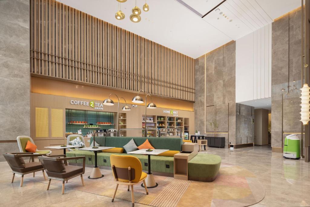 Posezení v ubytování Home2 Suite by Hilton Guangzhou Conghua