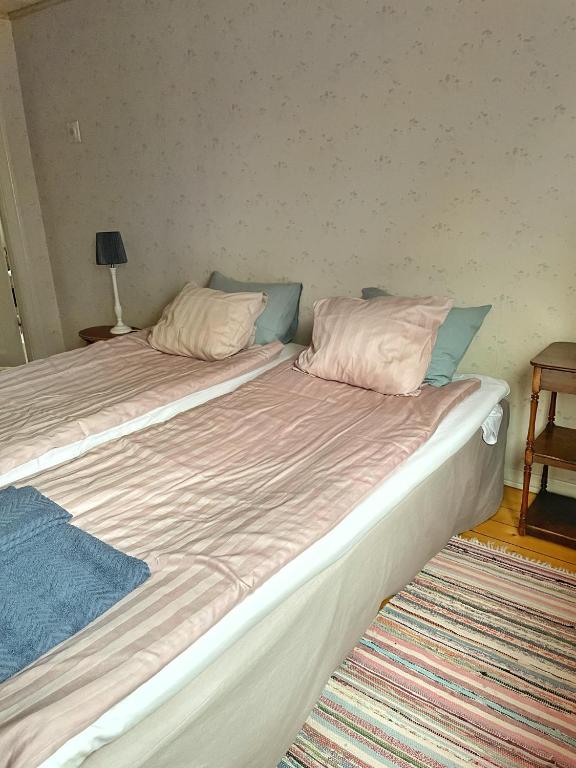Postel nebo postele na pokoji v ubytování Viktors Affärshus