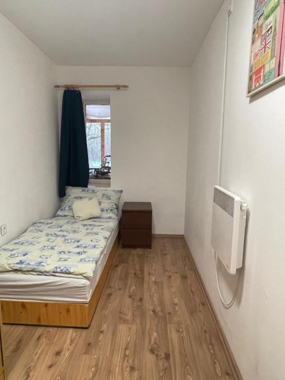 Łóżko lub łóżka w pokoju w obiekcie Sajó Vendégház