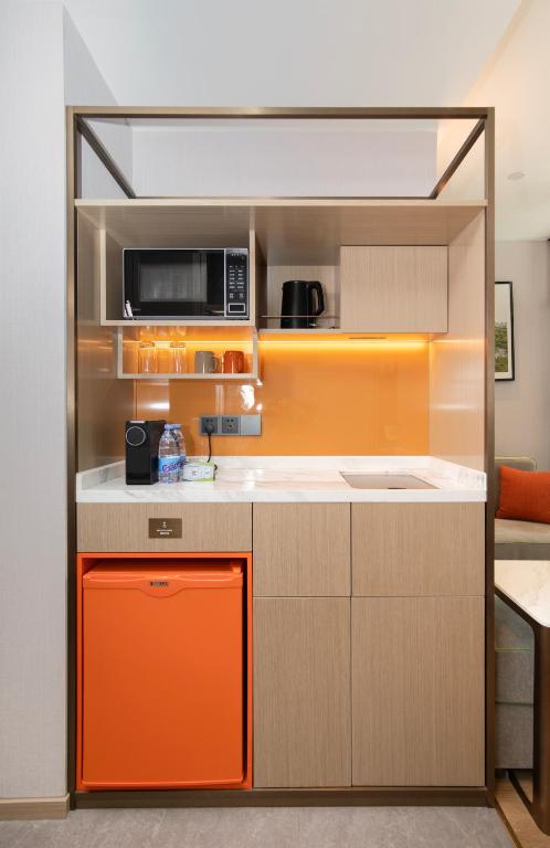Kuchyň nebo kuchyňský kout v ubytování Home2 Suite by Hilton Guangzhou Conghua