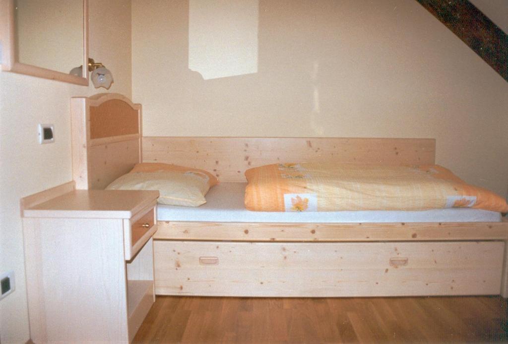 Posteľ alebo postele v izbe v ubytovaní Hotel Bruggerwirt