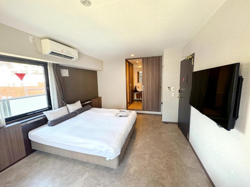 TV a/nebo společenská místnost v ubytování RE Hotel 梅田