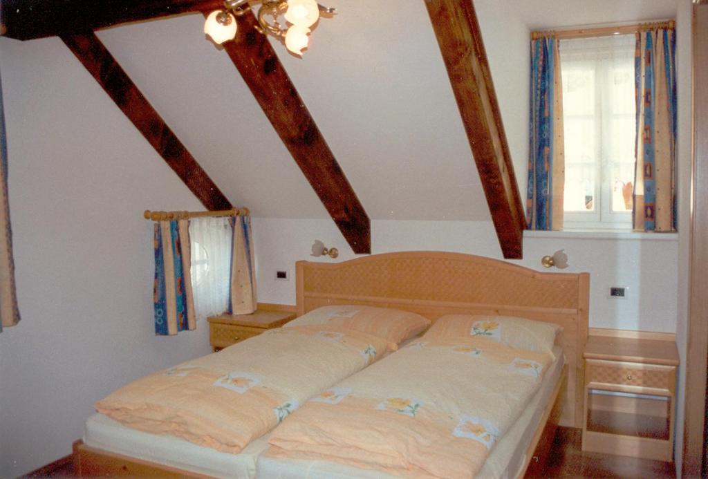 Posteľ alebo postele v izbe v ubytovaní Hotel Bruggerwirt
