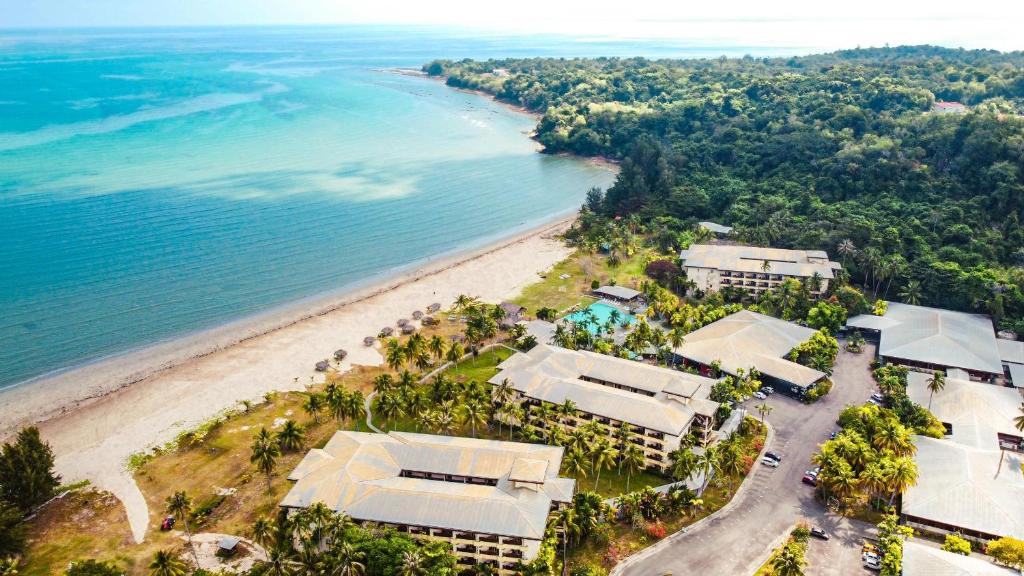 an aerial view of a resort and the beach at Palm Beach Resort & SPA in Labuan
