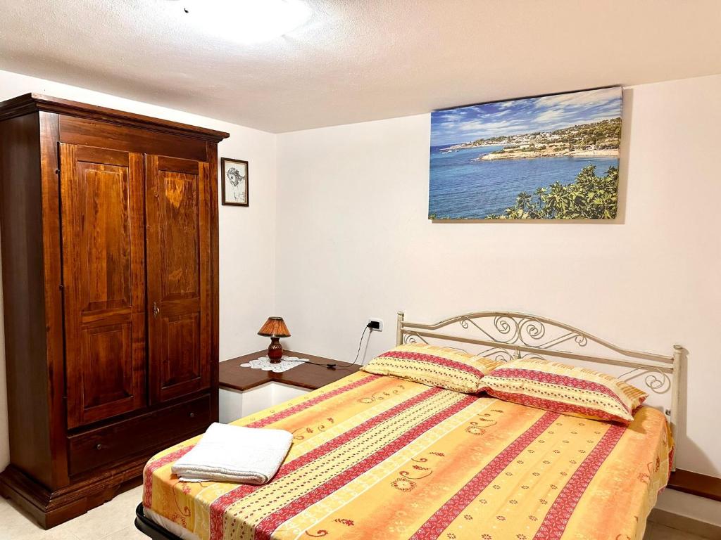 Postel nebo postele na pokoji v ubytování Appartamento Salentorelax