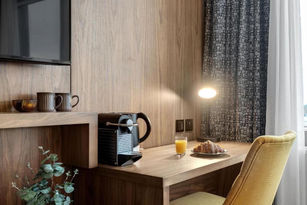 Příslušenství pro přípravu čaje a kávy v ubytování Hotel Muli