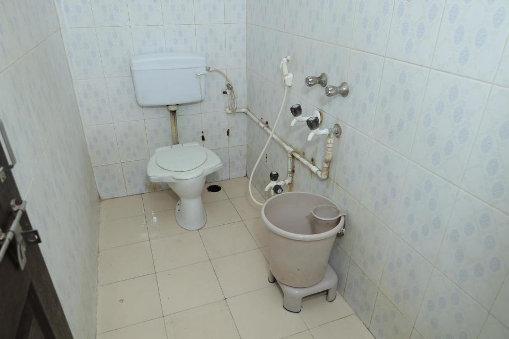 Koupelna v ubytování Laxminarayan service apartment