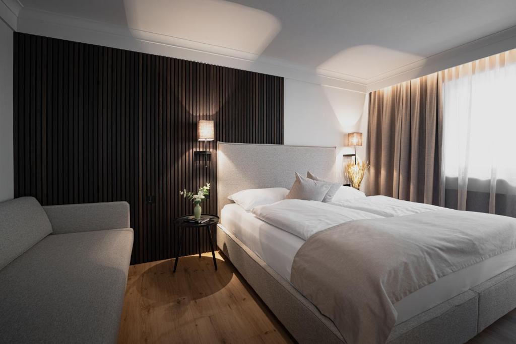 Postel nebo postele na pokoji v ubytování Hotel Schachner