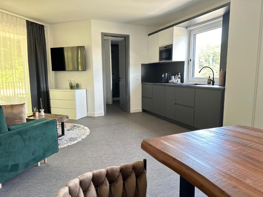 Kuchyň nebo kuchyňský kout v ubytování Boutique Hotel GreenLeaf