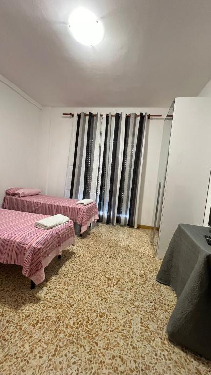 Postel nebo postele na pokoji v ubytování JR-ESCANIO