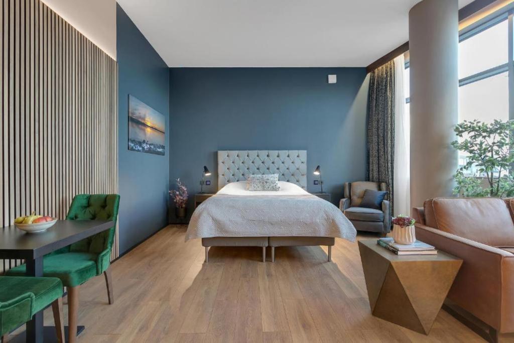 Postel nebo postele na pokoji v ubytování Hotel Muli