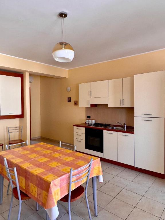 Kuchyň nebo kuchyňský kout v ubytování Medimare Residence Club
