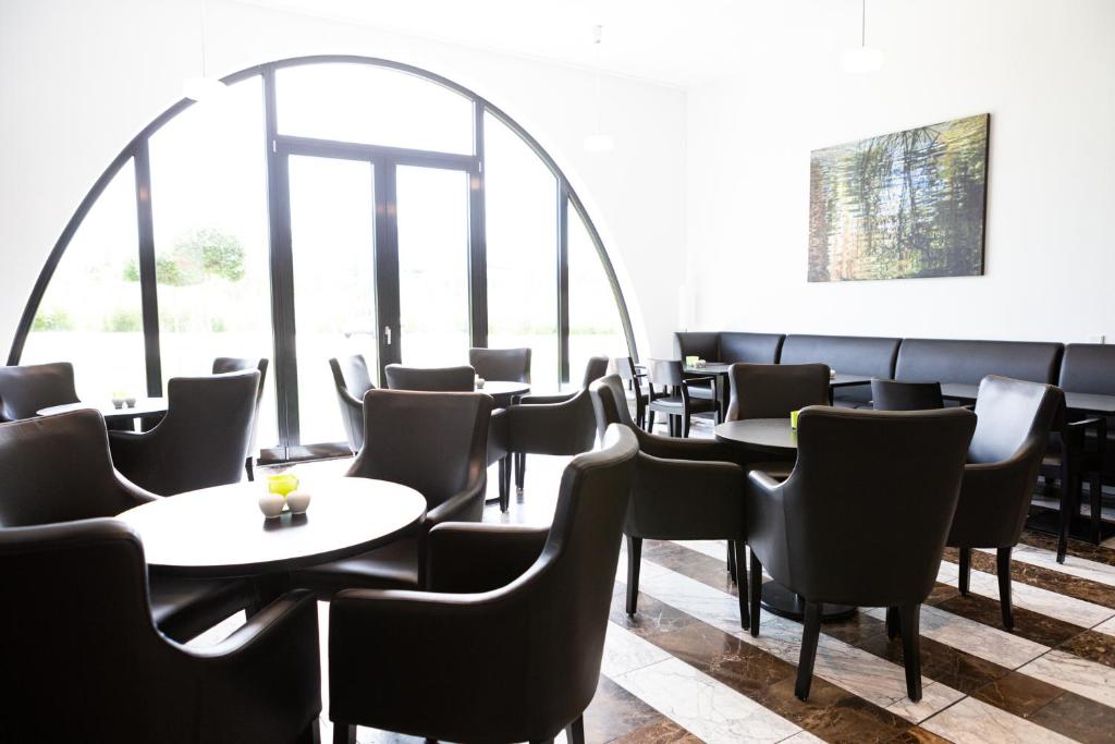 Posezení v ubytování Tobbaccon Hotel