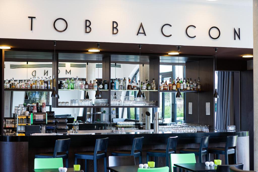 Lounge nebo bar v ubytování Tobbaccon Hotel