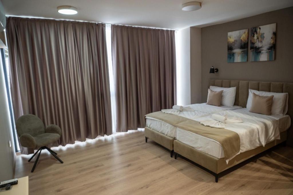 Postel nebo postele na pokoji v ubytování Hotel CENTRAL