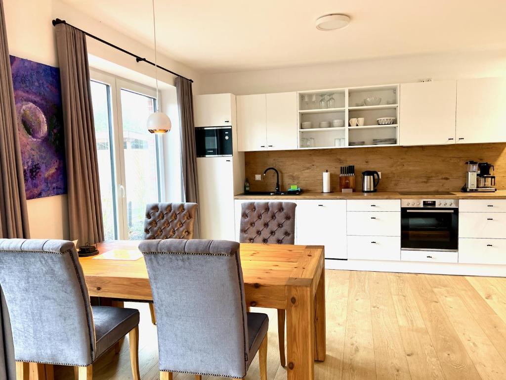 Kuchyň nebo kuchyňský kout v ubytování Apartmenthaus Emily by POLY Hohwacht