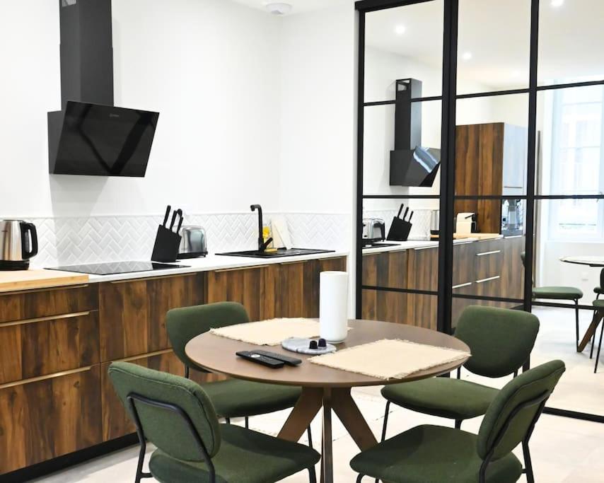 Kuchyň nebo kuchyňský kout v ubytování Splendide Appartement haut de gamme hyper centre