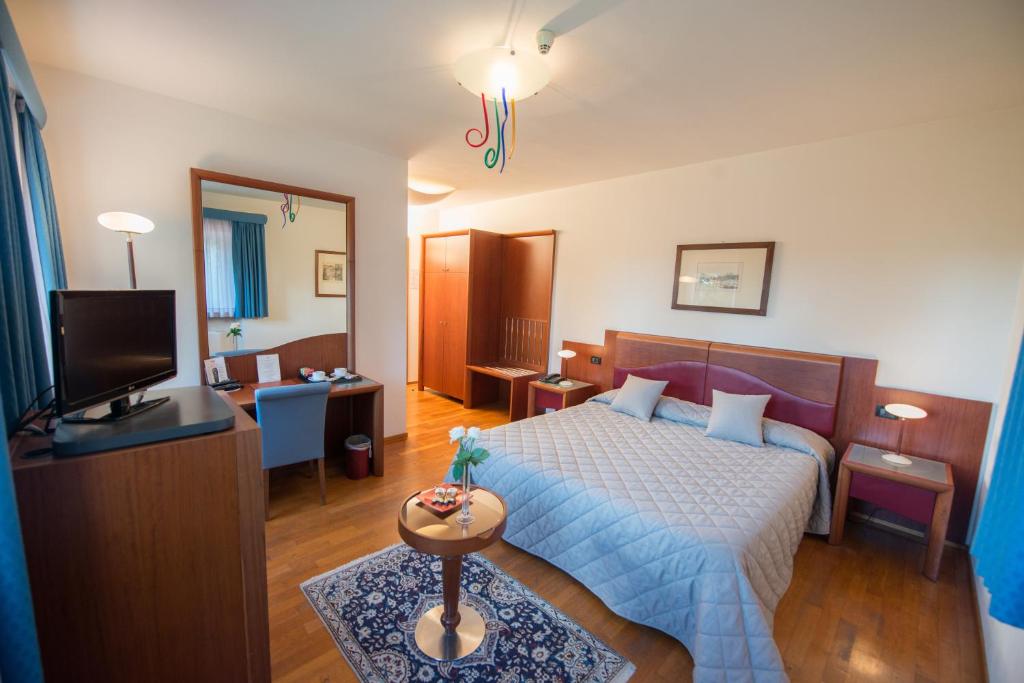 TV a/nebo společenská místnost v ubytování Relais Villa Matarazzo