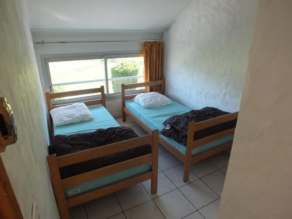 Postel nebo postele na pokoji v ubytování relais d'isaby
