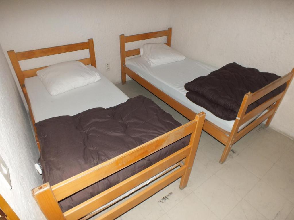 Postel nebo postele na pokoji v ubytování relais d'isaby