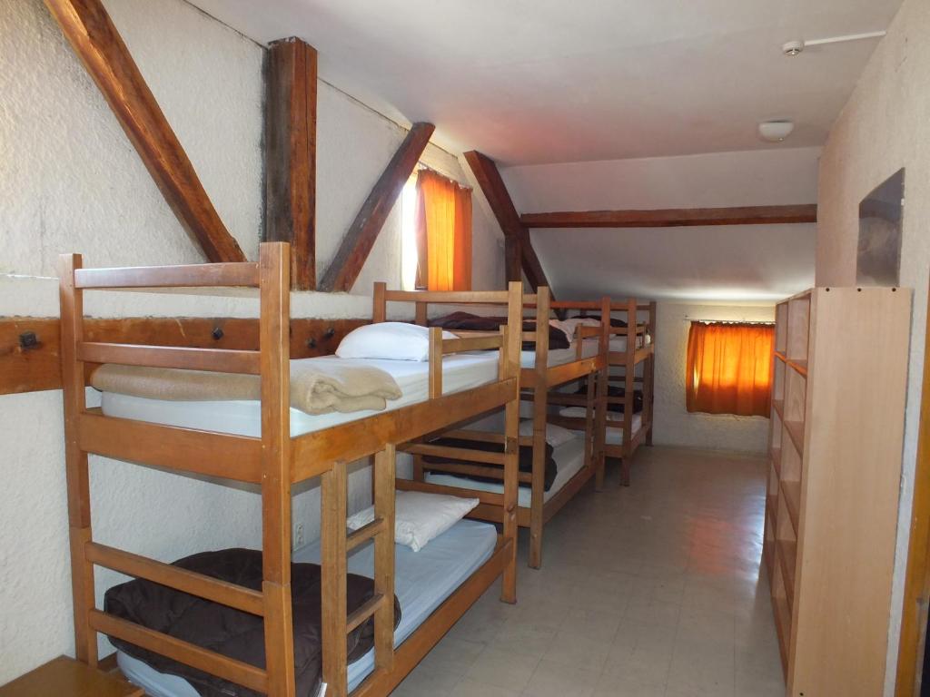 Postel nebo postele na pokoji v ubytování relais d'isaby