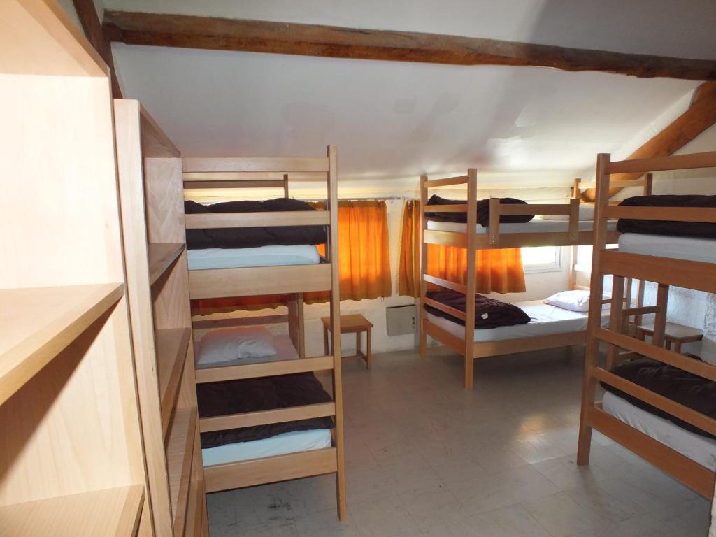 Postel nebo postele na pokoji v ubytování relais d'isaby
