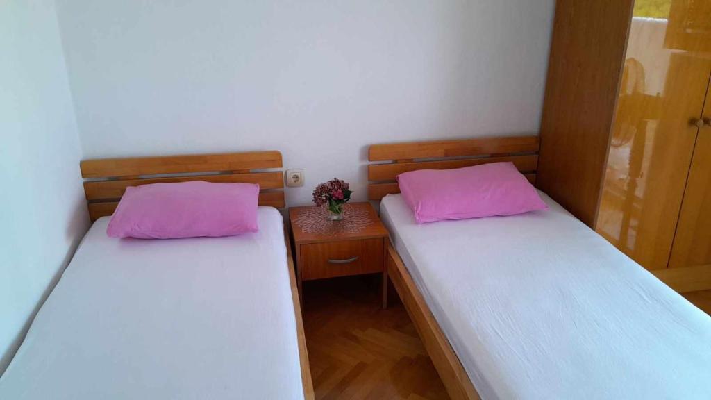 Postel nebo postele na pokoji v ubytování Anika apart