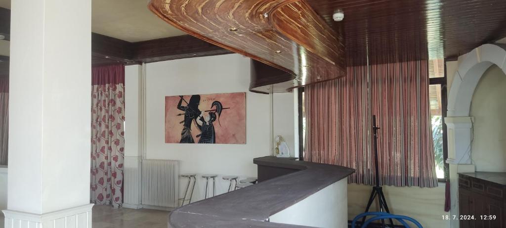 Postel nebo postele na pokoji v ubytování PANTHEON HALL HOTEL