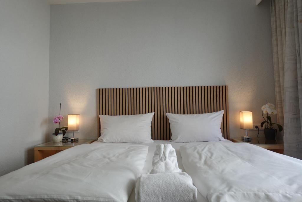 Postel nebo postele na pokoji v ubytování Hotel Birnbaum