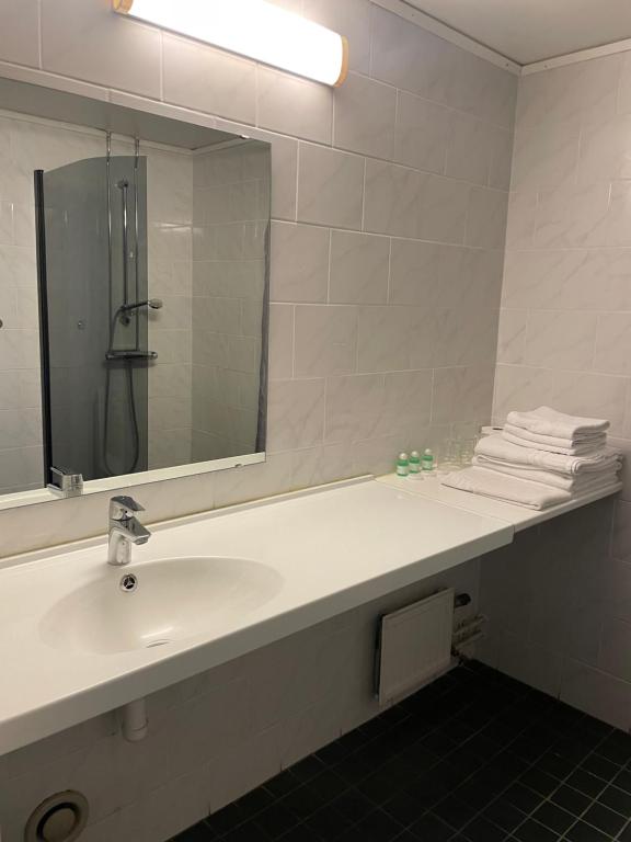 Koupelna v ubytování Hotell Smedjan