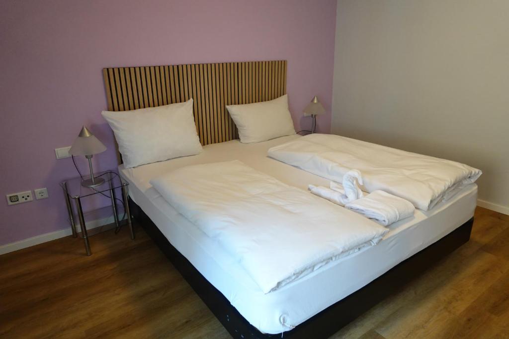 Postel nebo postele na pokoji v ubytování Hotel Birnbaum