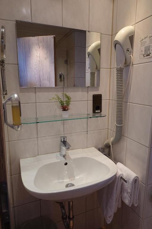 Koupelna v ubytování Hotel Birnbaum